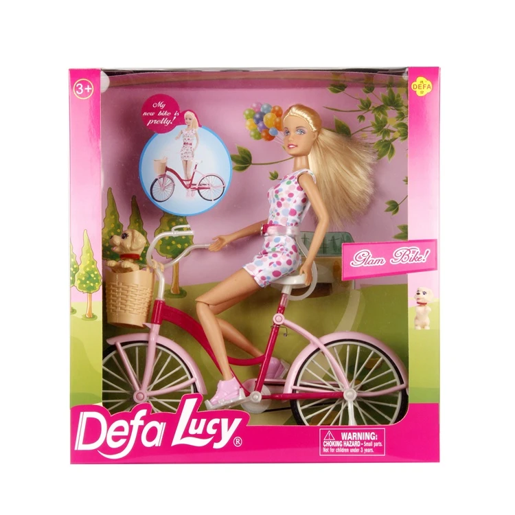 Кукла "Defa" на велосипеде