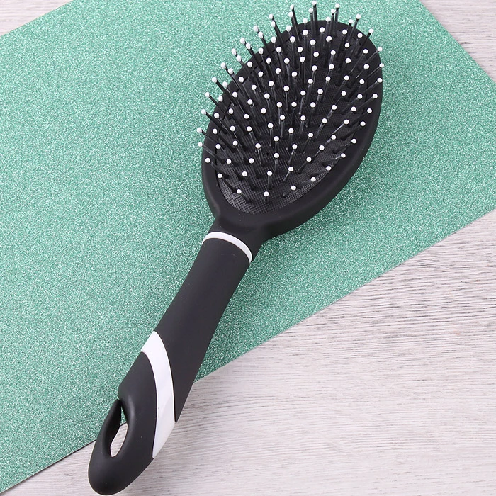 Расческа массажная овальная пластиковая черная Расческа массажная овальная пластиковая черная