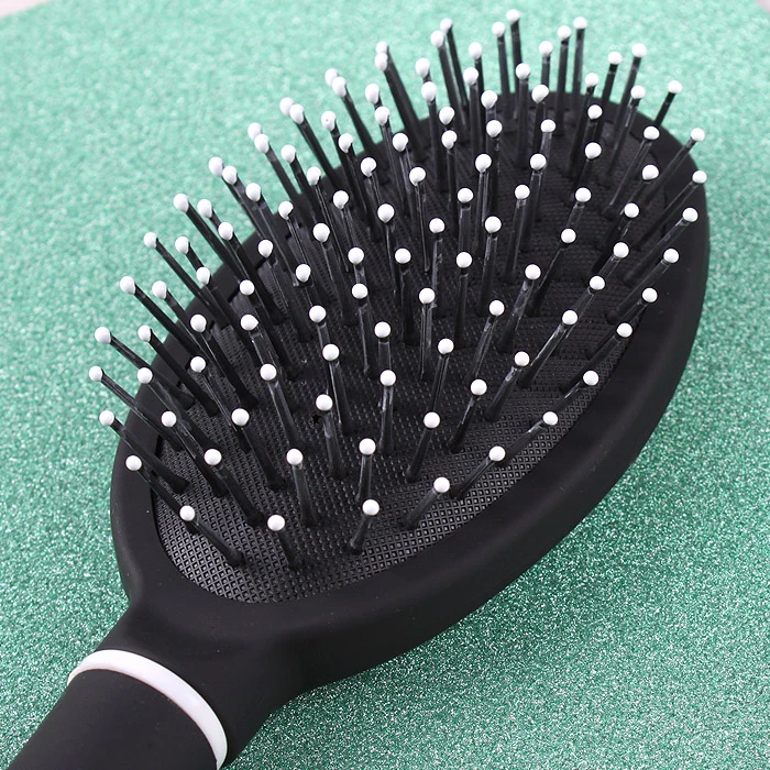 Расческа массажная овальная пластиковая черная Расческа массажная овальная пластиковая черная