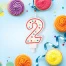 Свеча-цифра для торта "2" ДВУСТОРОННЯЯ с конфетти, 8,5 см, ЗОЛОТАЯ