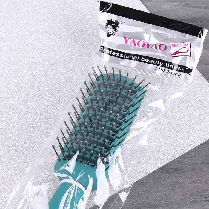 Расческа массажная прямоугольная пластиковая бирюзовая Расческа массажная прямоугольная пластиковая бирюзовая